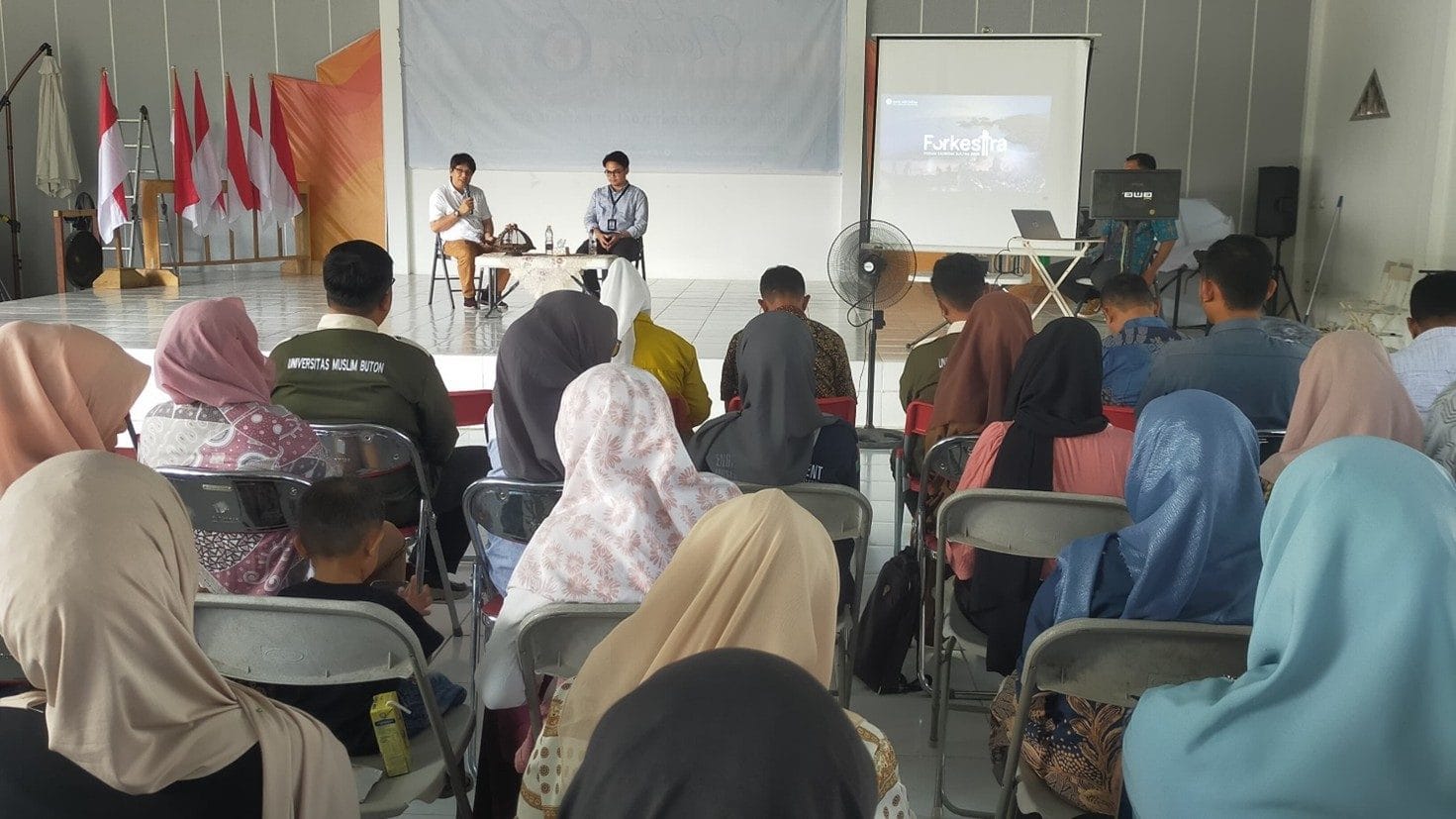 UMU BUTON – BI BAHAS FORKESTRA 2025